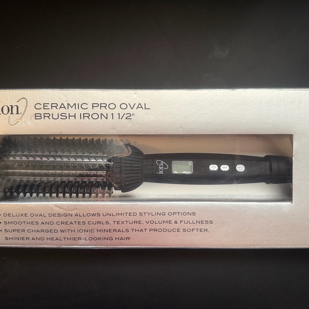 Opened box. New Black Ceramic Pro Oval Brush Iron 1 1/2 in